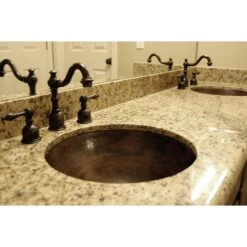 Premier Copper Products Under-Counter Round Hammered Copper Bathroom Sink In Oil Rubbed Bronze -Valspa Bathroom Shop b5b139b9ea0d18c60d14490bda62d138 1800x1800